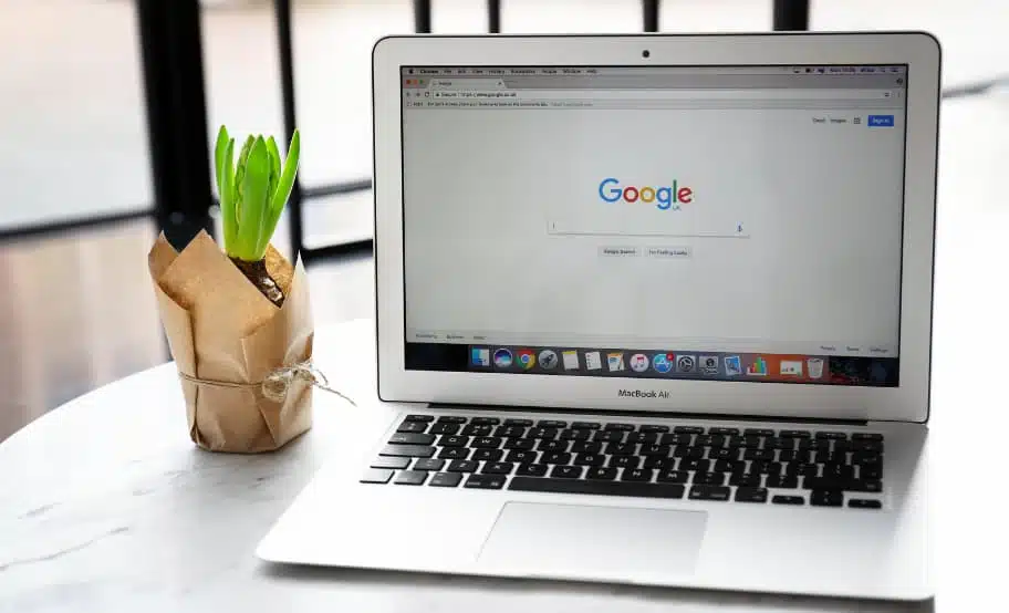 A laptop with Google Search page